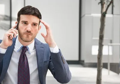 Person working on laptop in office setting